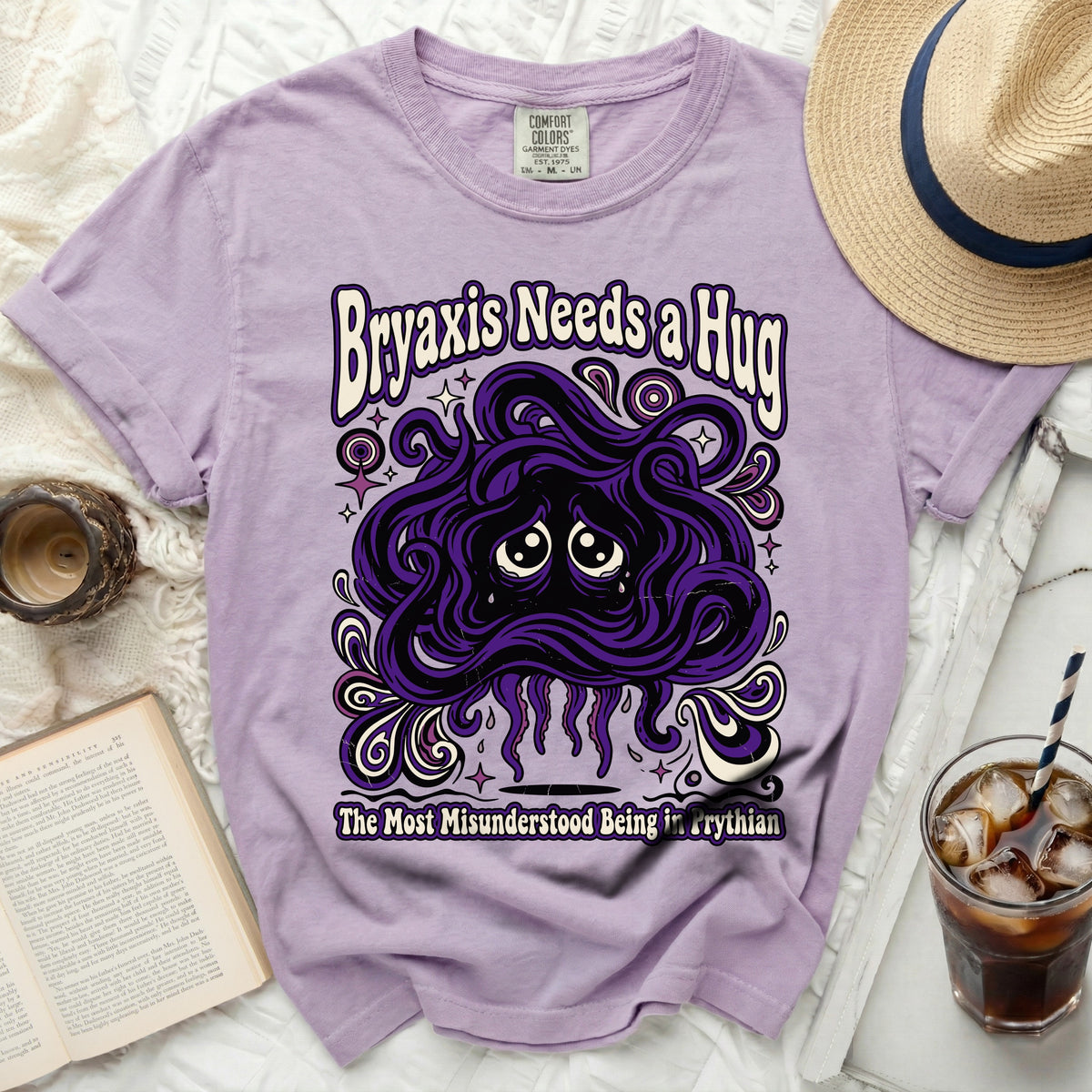 Lavender t-shirt with purple "Bryaxis Needs a Hug" graphic.