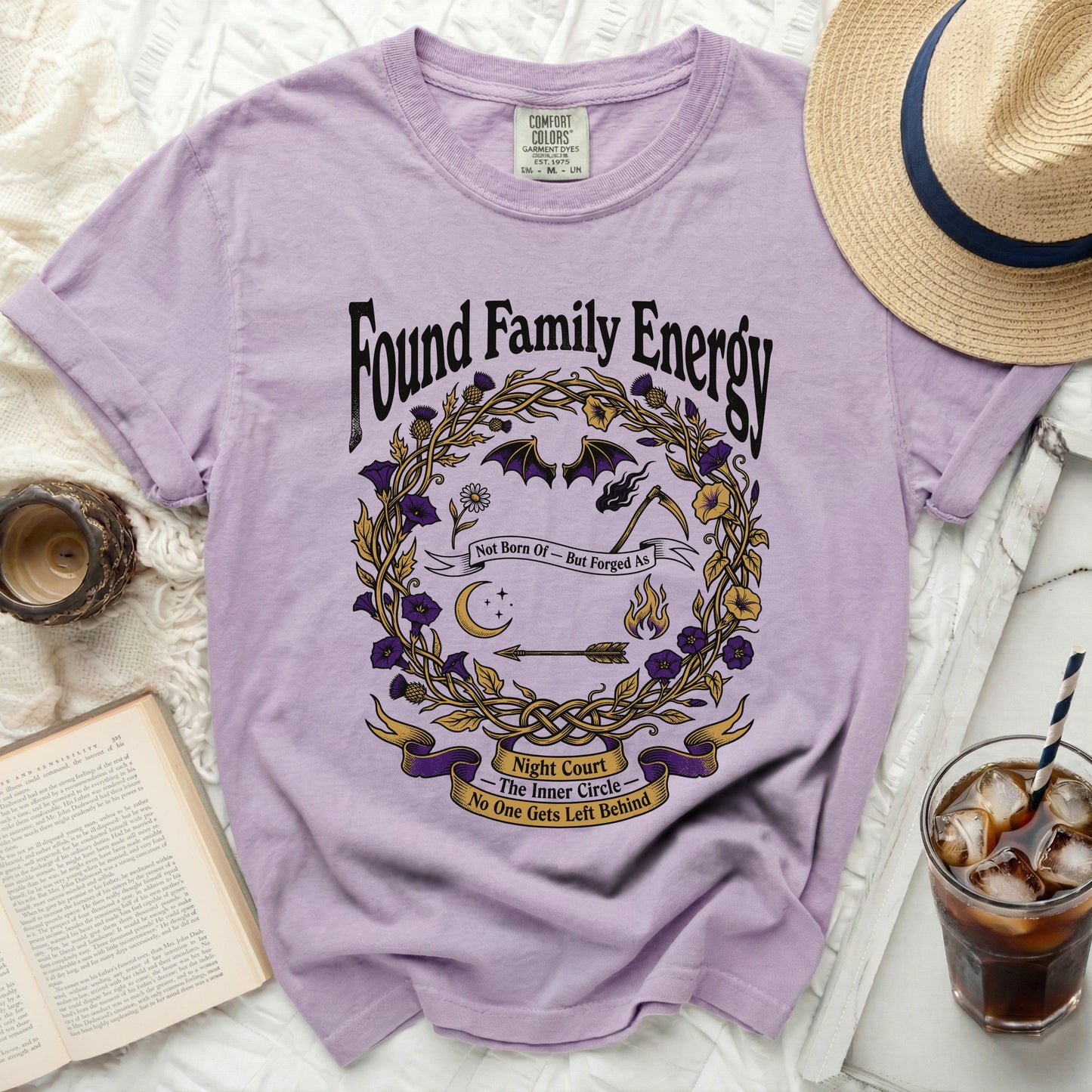 Purple t-shirt with "Found Family Energy" and "Night Court" graphic.