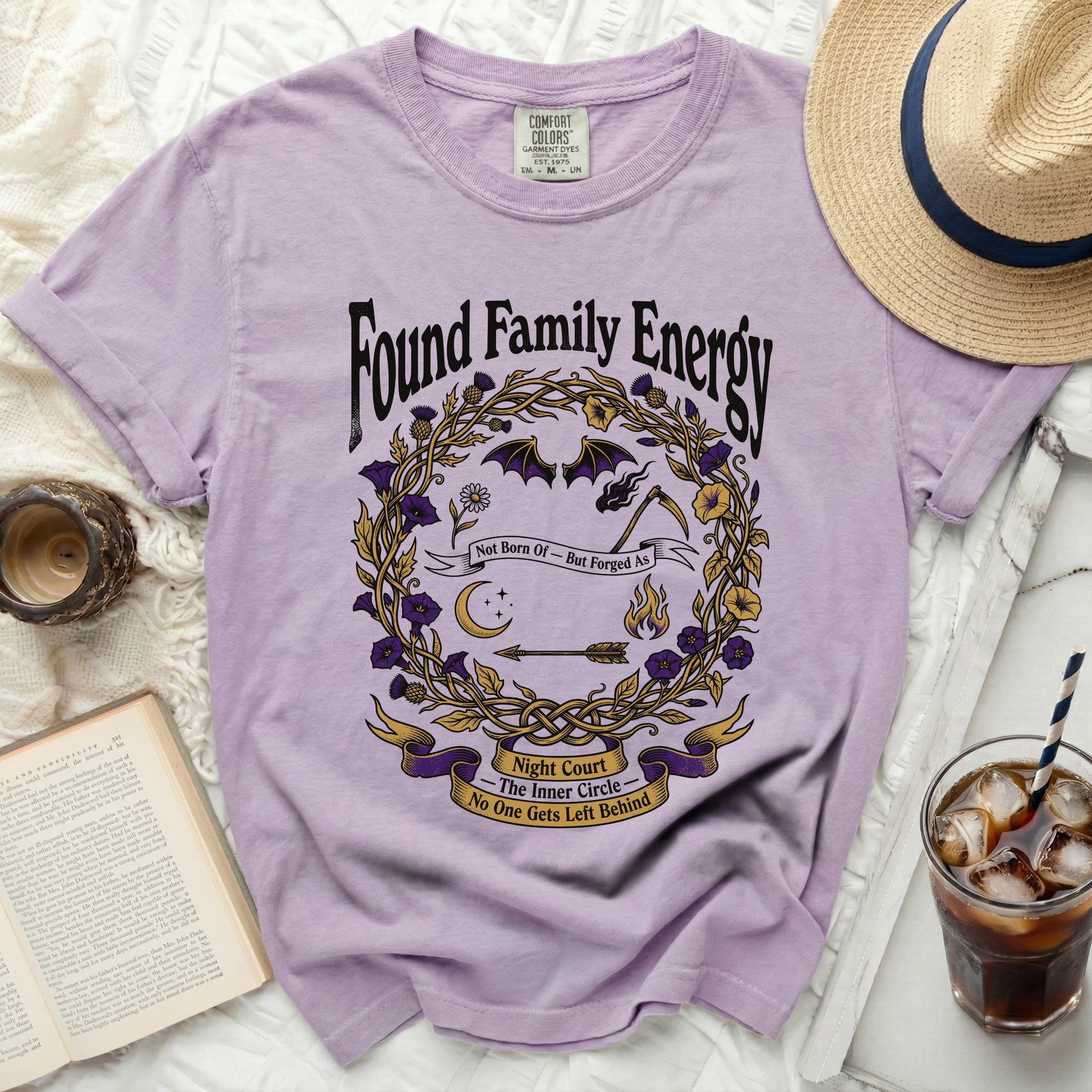 Purple t-shirt with "Found Family Energy" and "Night Court" graphic.