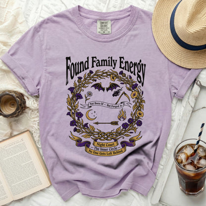Purple t-shirt with "Found Family Energy" and "Night Court" graphic.