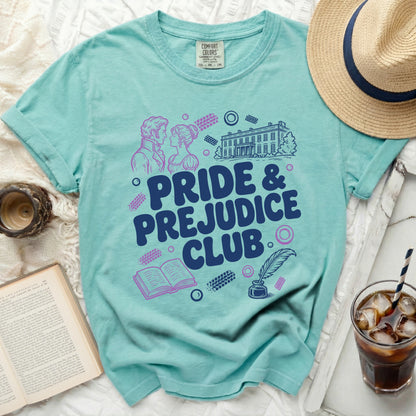 Turquoise t-shirt with Pride and Prejudice Club graphic and literary icons.