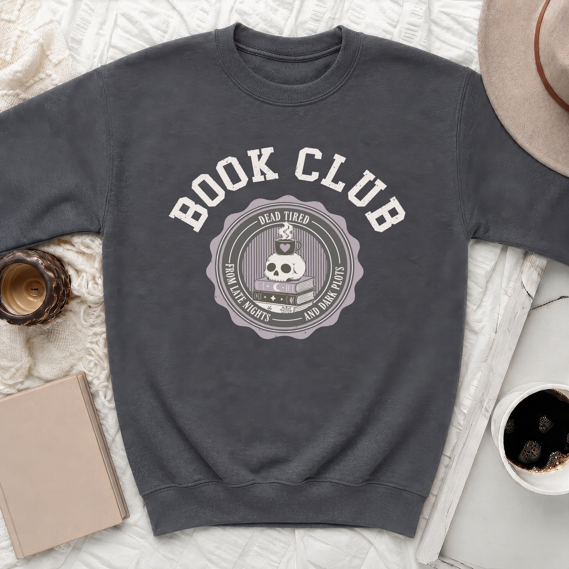 Crewneck sweatshirt with "Book Club" and skull, coffee, and book graphic.