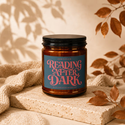 Amber candle labeled "Reading After Dark" by MagicMerchEmporium.