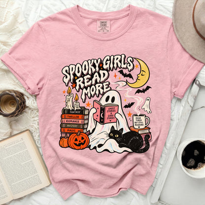 Pink t-shirt with "Spooky Girls Read More" Halloween graphic featuring a ghost, cat, and books.