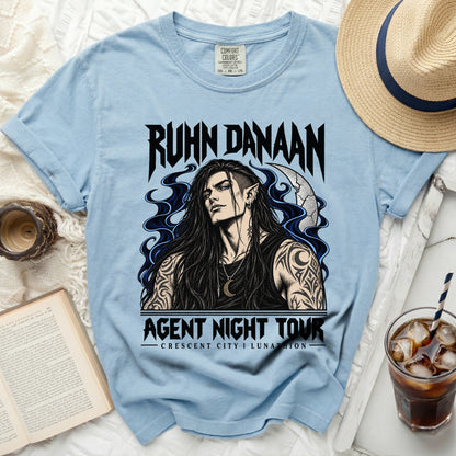 Blue t-shirt with "RUHN DANAAN" and "AGENT NIGHT TOUR" graphic.