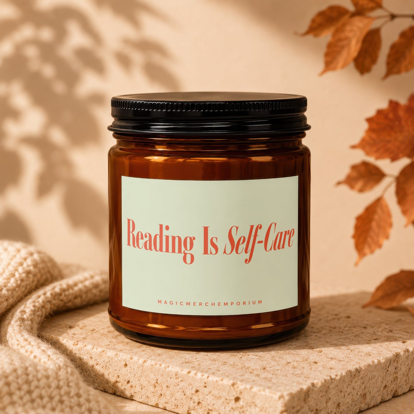 Brown apothecary jar candle with white label saying "Reading Is Self-Care".