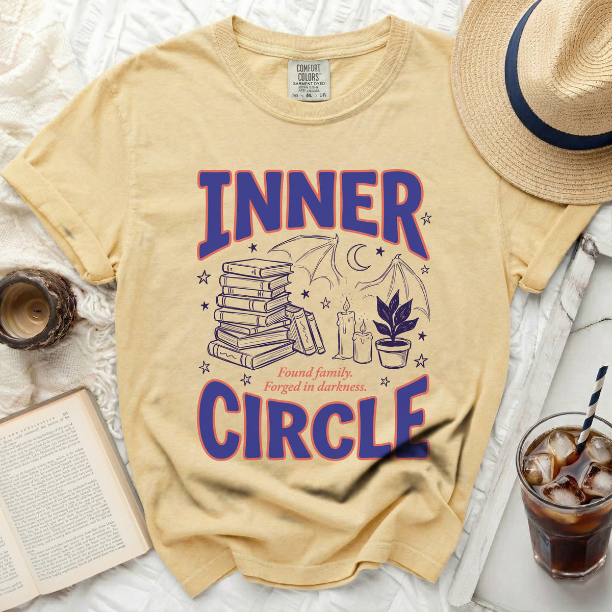 Yellow t-shirt with "INNER CIRCLE" text and occult-themed graphics.