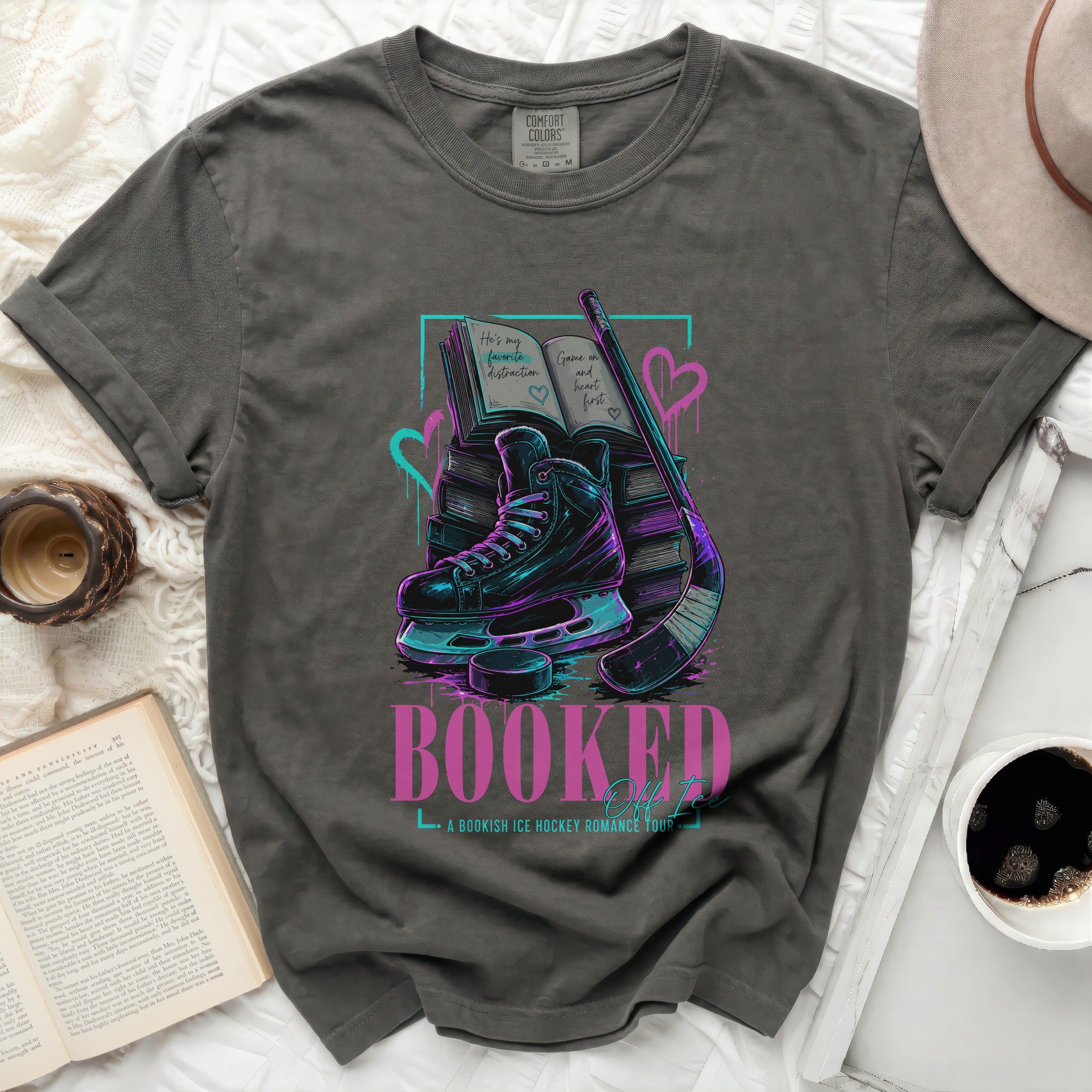 Booked: A bookish ice hockey romance tour t-shirt.