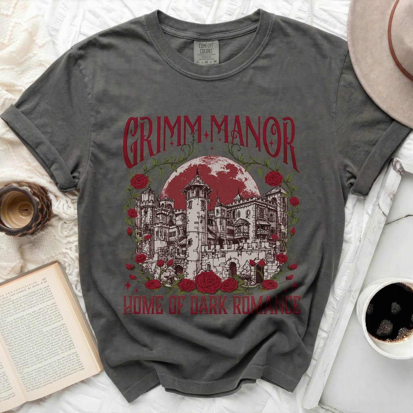 Grimm Manor Home of Dark Romance t-shirt with castle and roses.