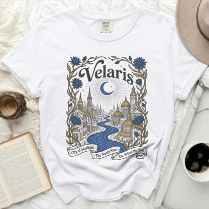 White t-shirt with "Velaris City of Starlight The North Star Est. Before the Wall" graphic.