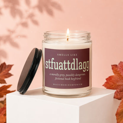 Scented candle with "stfuattdlagg a morally grey, possibly dangerous, fictional book boyfriend" label.