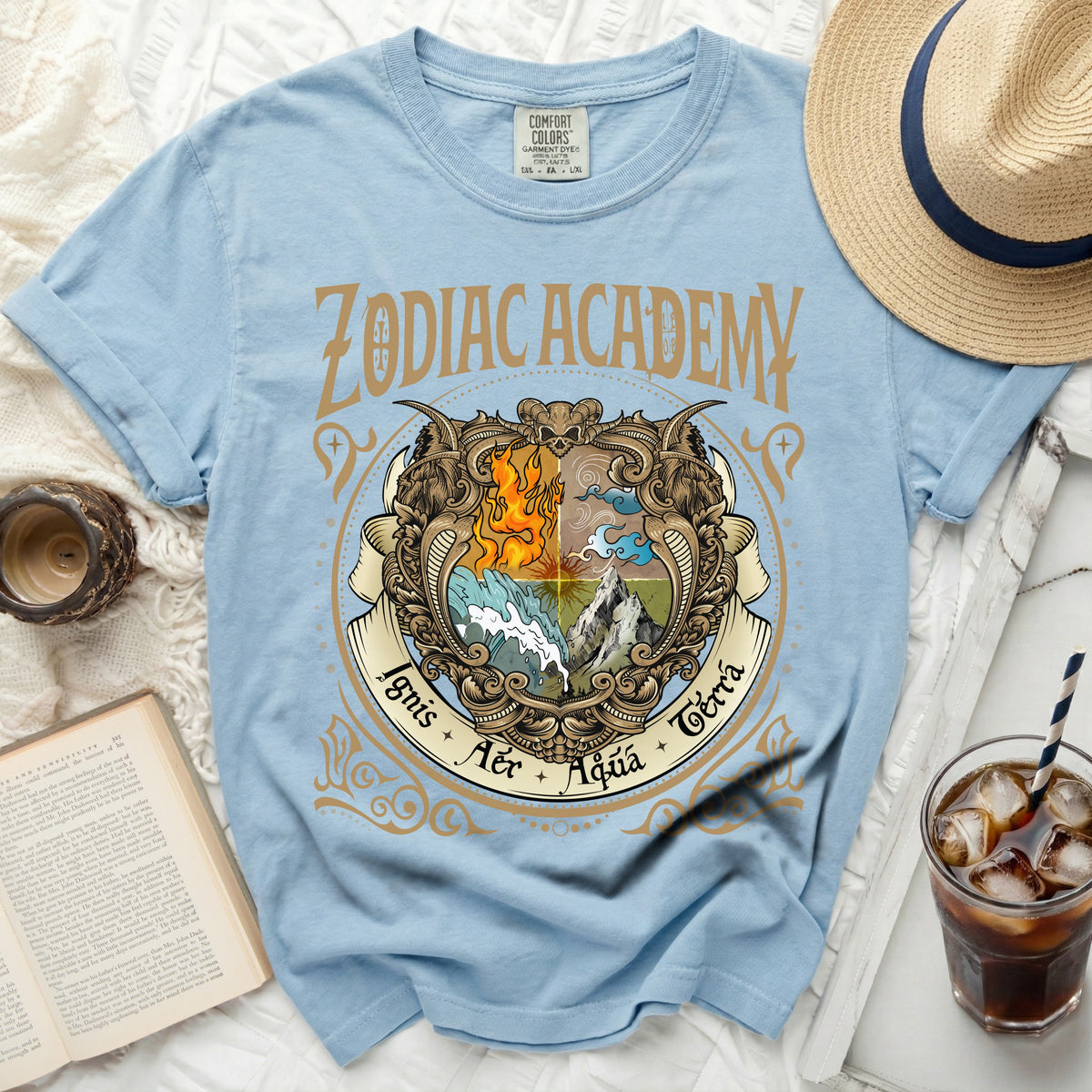 Light blue t-shirt with "Zodiac Academy" and elemental crest design.