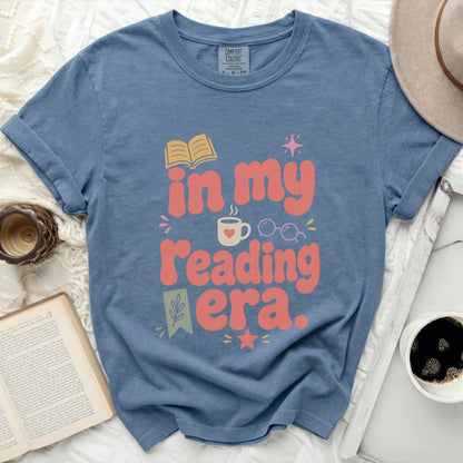 "In my reading era" graphic on a blue Comfort Colors t-shirt.