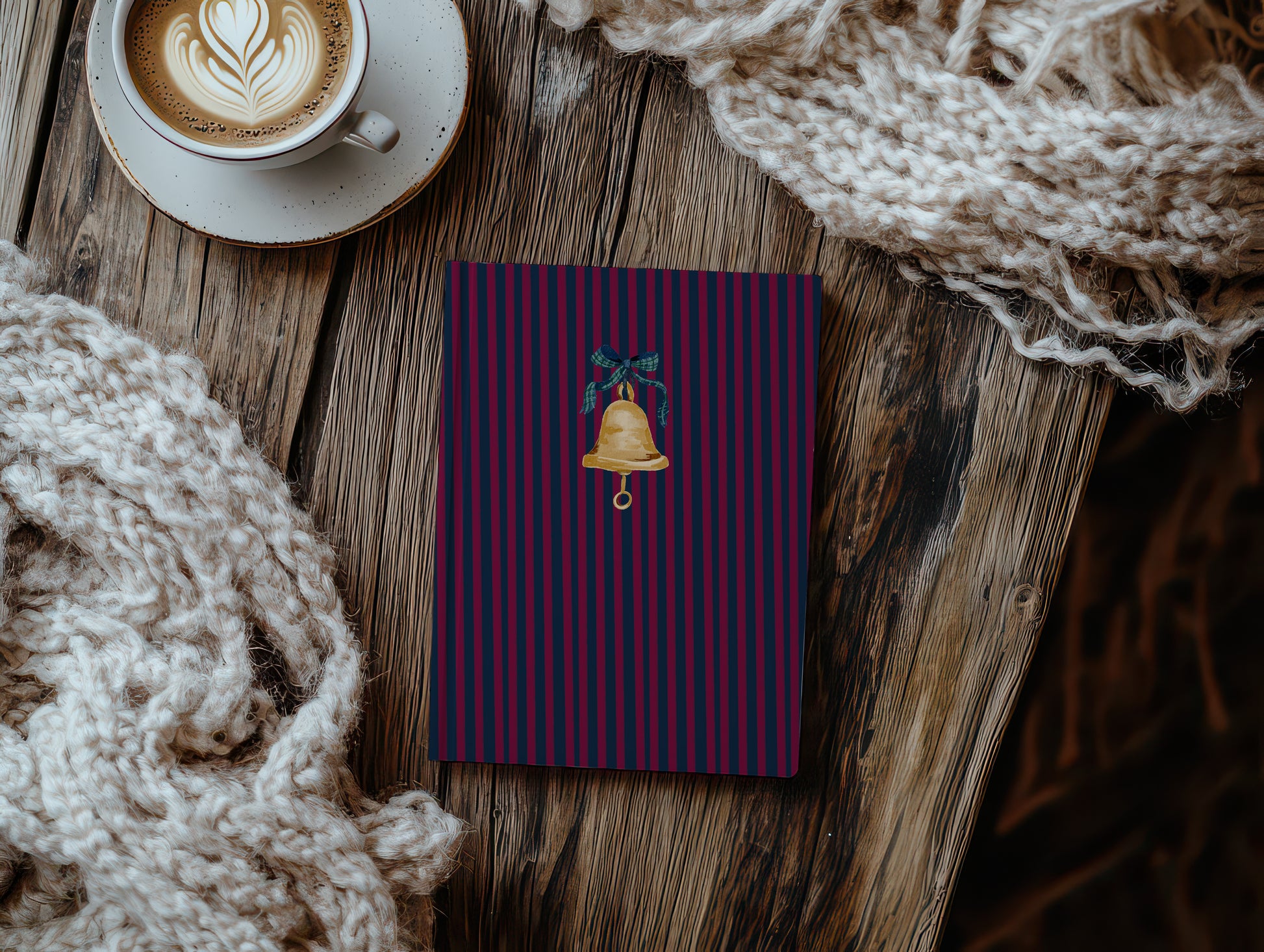 Festive striped notebook with golden bell design