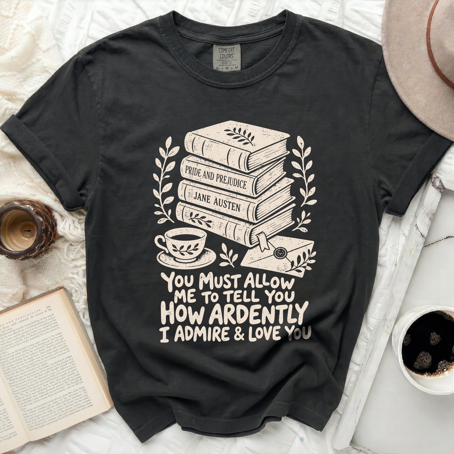 T-shirt with stacked books, tea cup, and quote: "You Must Allow Me To Tell You How Ardently I Admire & Love You."