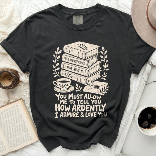T-shirt with stacked books, tea cup, and quote: "You Must Allow Me To Tell You How Ardently I Admire & Love You."