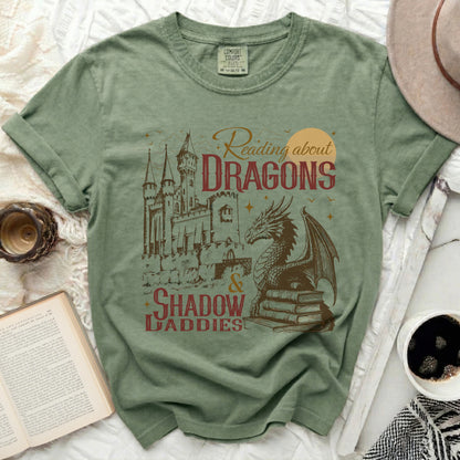 Comfort Colors shirt with "Reading about DRAGONS & SHADOW DADDIES" graphic.