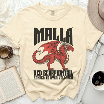 Cream t-shirt with red dragon graphic and text "MALLA RED SCORPIONTAIL BONDED TO NYRA VOLDAREN".