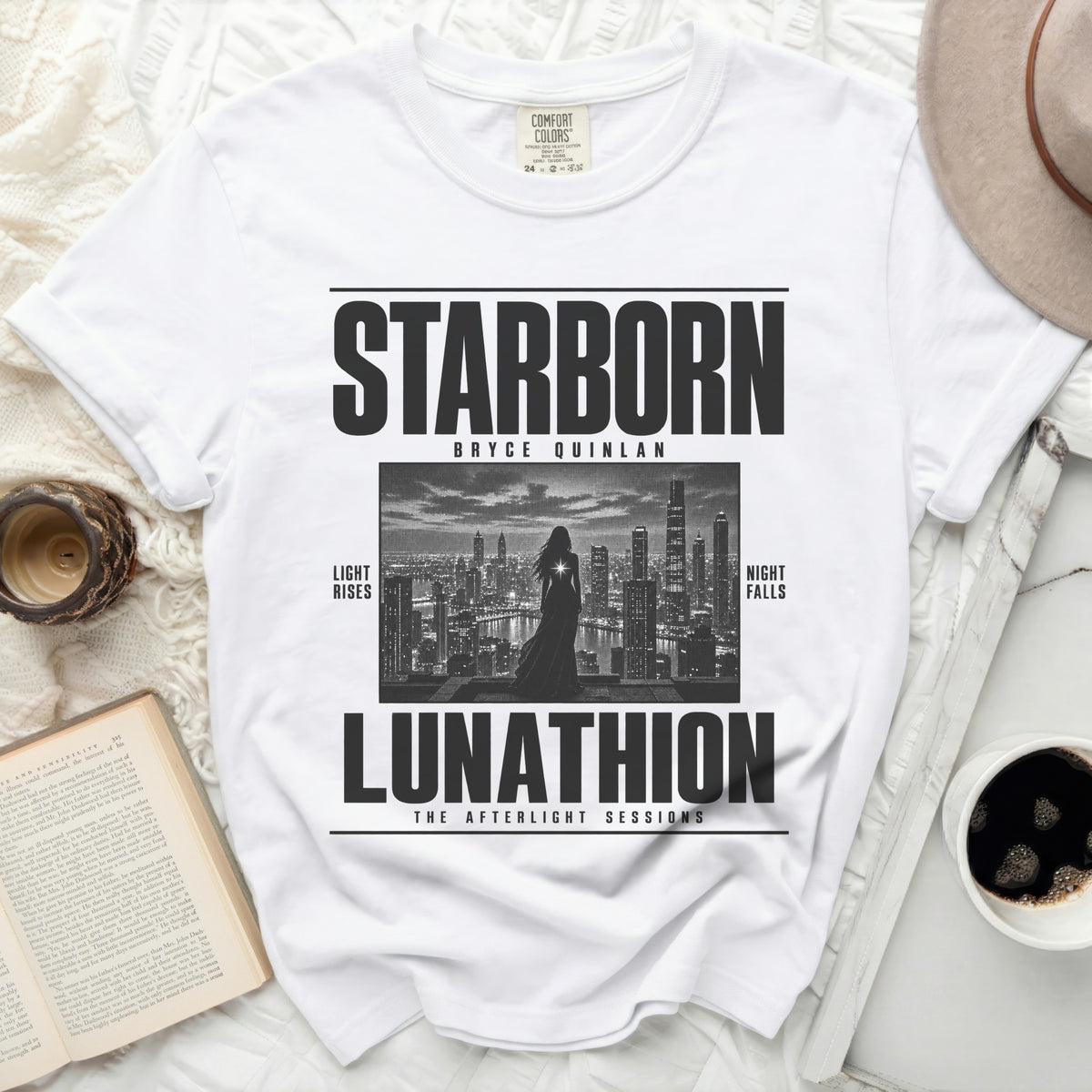 White t-shirt with STARBORN BRYCE QUINLAN LUNATHION text and city graphic.