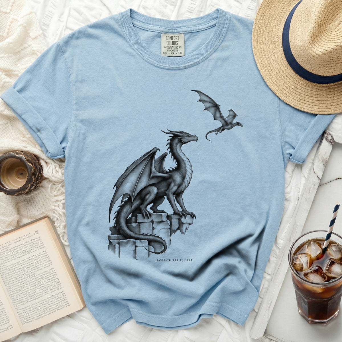 Light blue t-shirt with two dragons and "BASGIATH WAR COLLEGE" text.