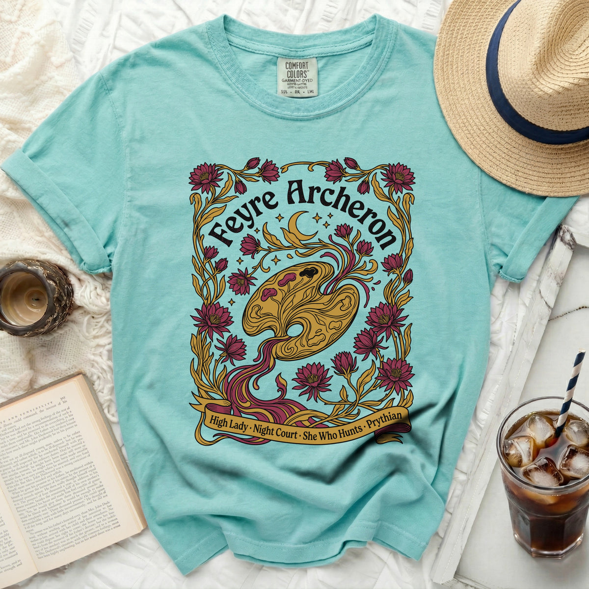 Teal shirt with Feyre Archeron floral design and text.
