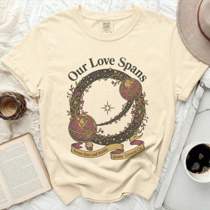 Cream t-shirt with "Our Love Spans Across Stars and Worlds" graphic.