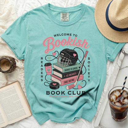 Aqua t-shirt with "Bookish Readers Society" text and hockey graphic.