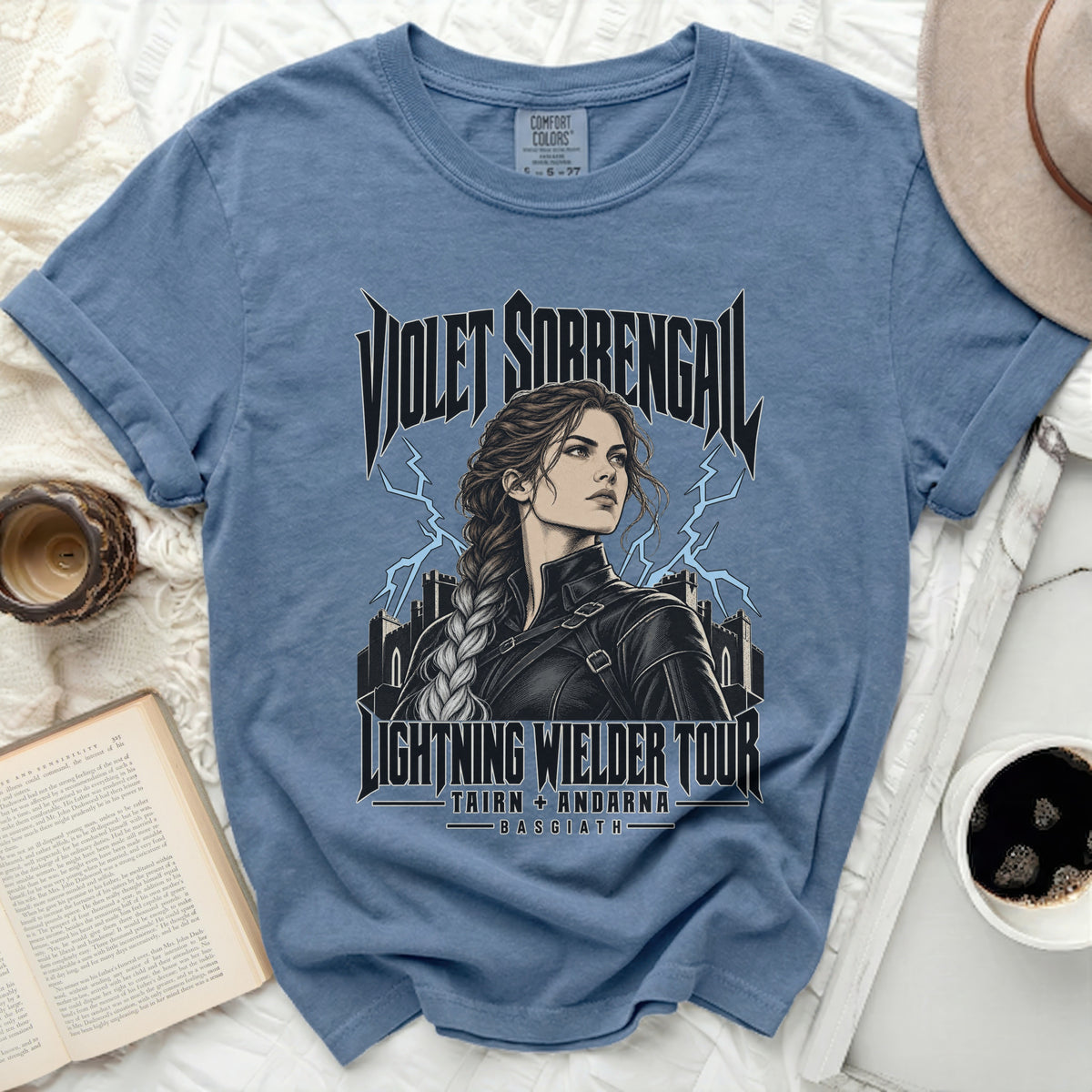 Blue t-shirt with "Violet Sorrengal Lightning Wielder Tour" graphic.