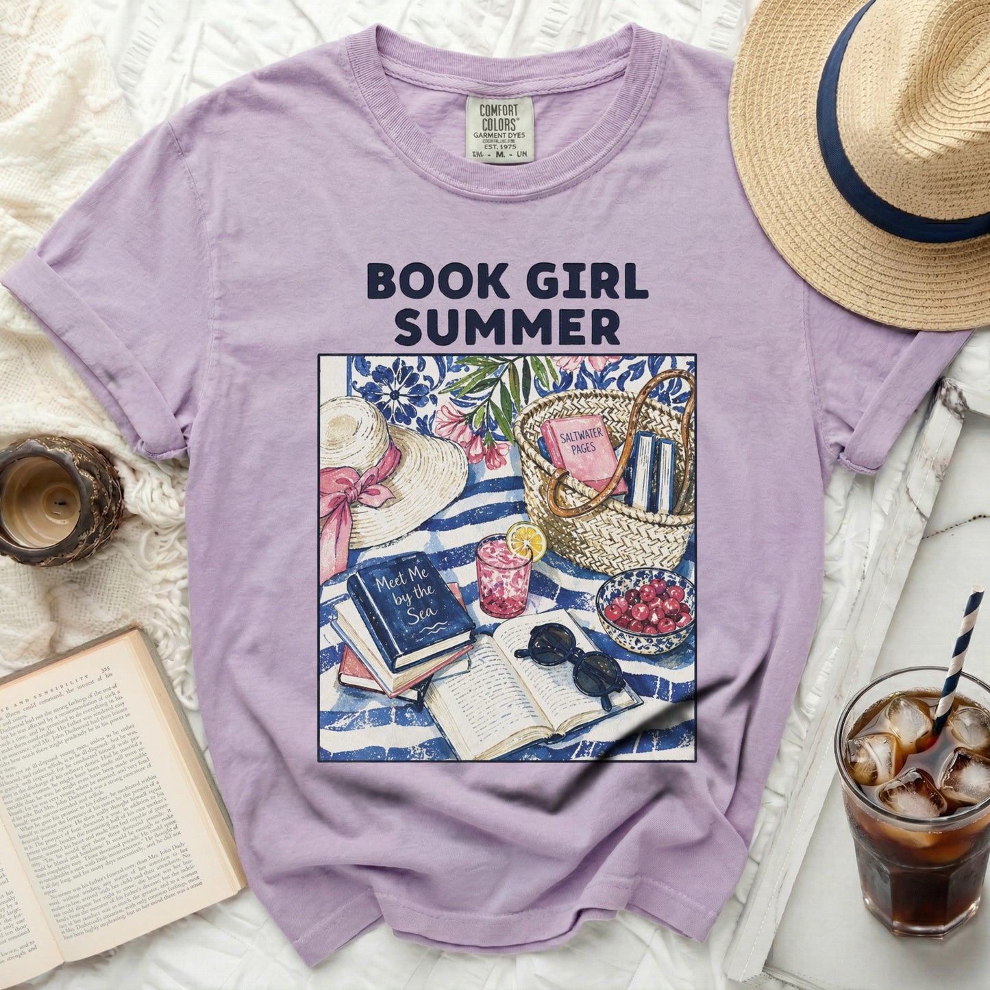 T-shirt with "Book Girl Summer" graphic of books, hat, and fruit.