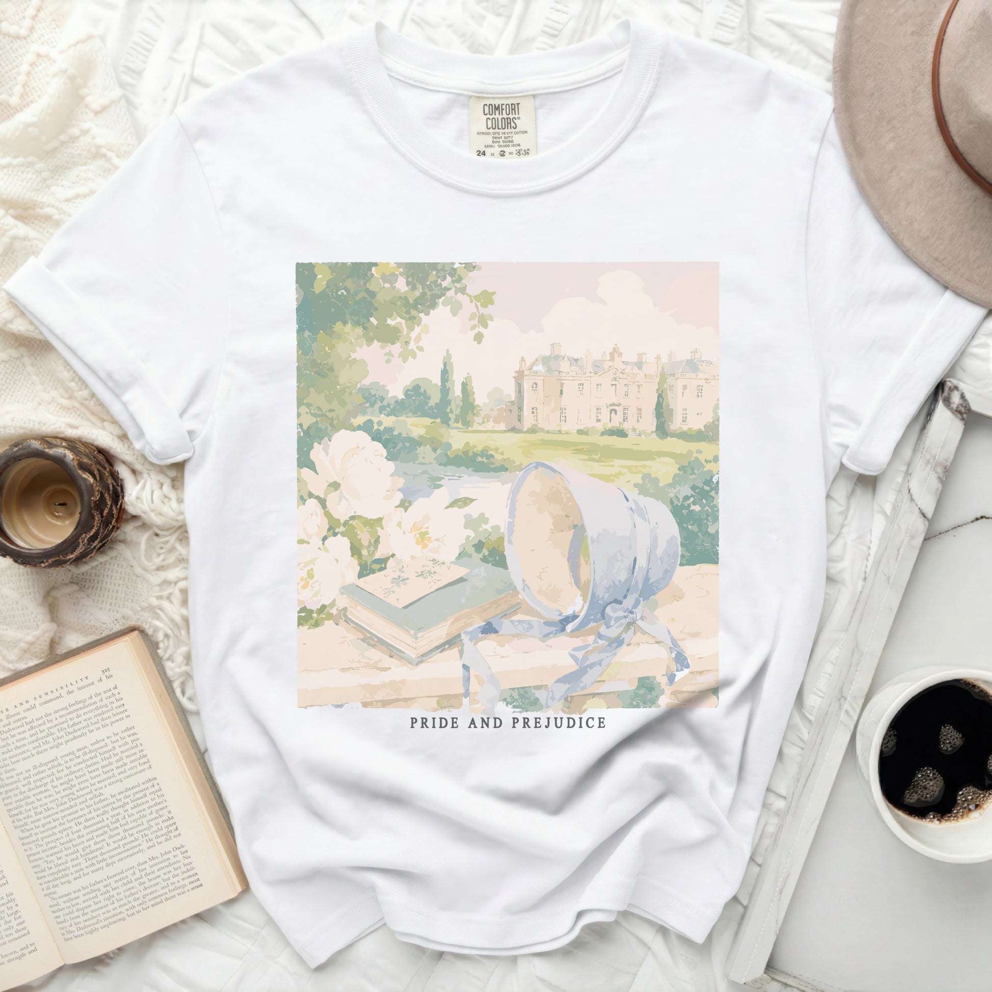 White Comfort Colors t-shirt with "Pride and Prejudice" graphic print.
