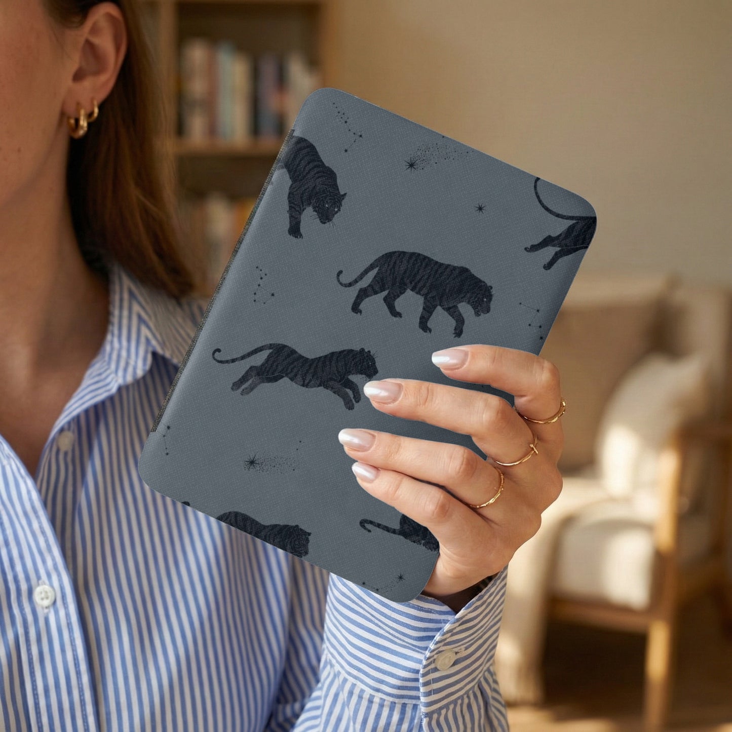 Dark grey tablet cover with black tiger and constellation pattern.