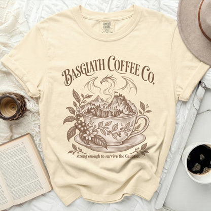 Basgiath Coffee Co. shirt with dragon and mountains inside a coffee cup.