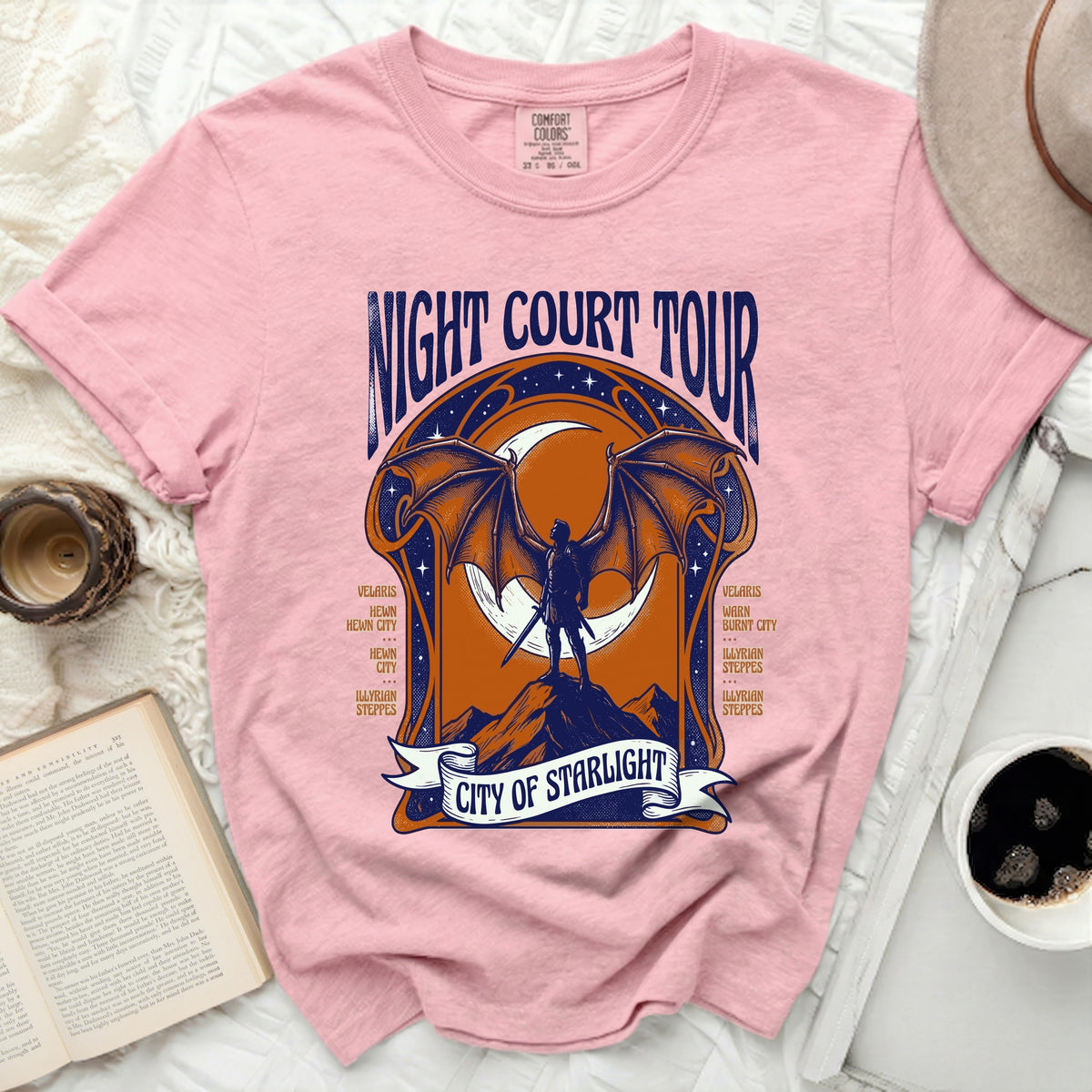 Pink t-shirt with "Night Court Tour City of Starlight" graphic.