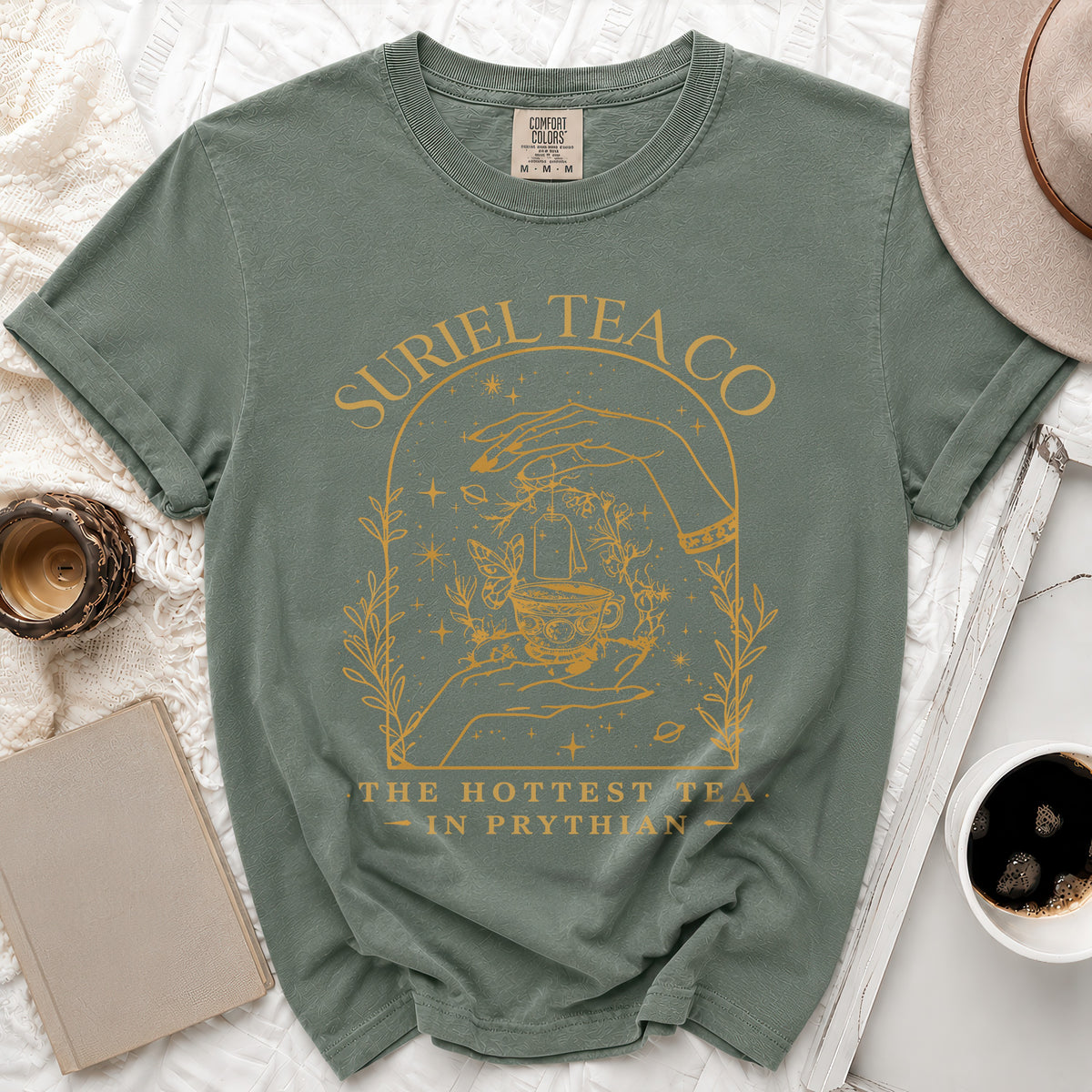 Sage green Comfort Colors t-shirt with "Suriel Tea Co. The Hottest Tea - In Prythian" design.