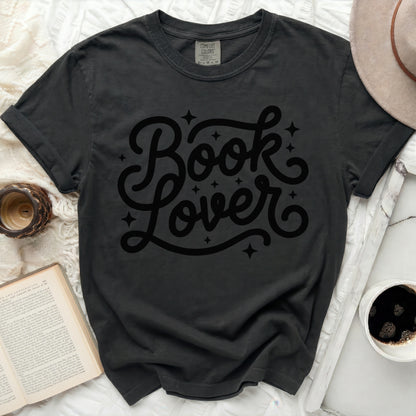 Black t-shirt with "Book Lover" text and stars.