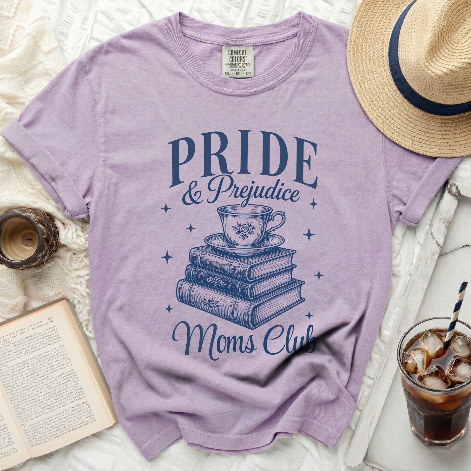 Lavender t-shirt with "Pride & Prejudice Moms Club" graphic and teacup.