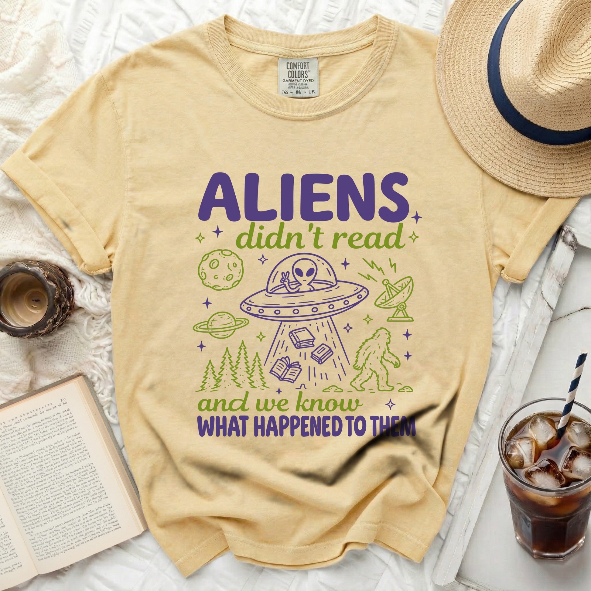 Yellow t-shirt with graphic text "ALIENS didn't read and we know WHAT HAPPENED TO THEM".