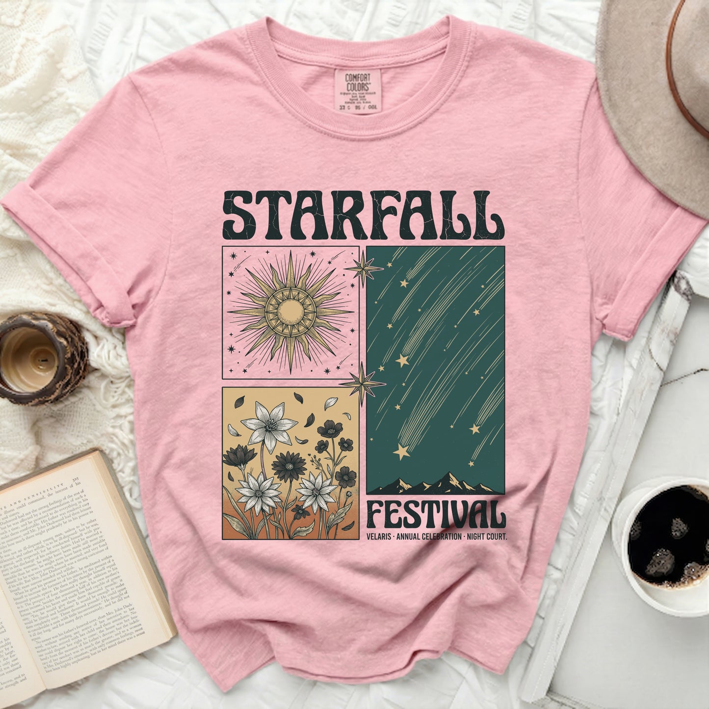 Pink t-shirt with "STARFALL FESTIVAL" graphic of sun, flowers, and meteors.