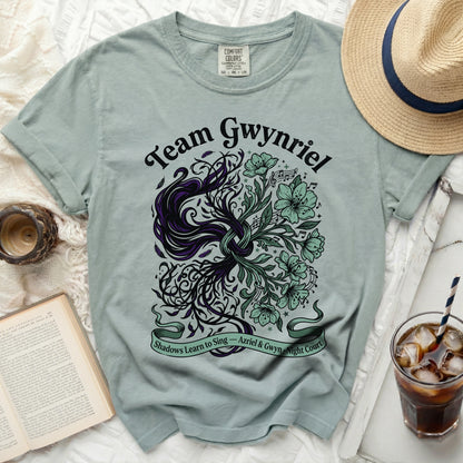 Team Gwynriel shirt with floral and script design, "Shadows Learn to Sing".