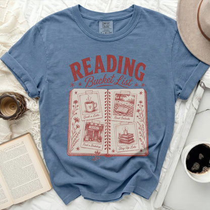 T-shirt with "Reading Bucket List" and four illustrated activities.