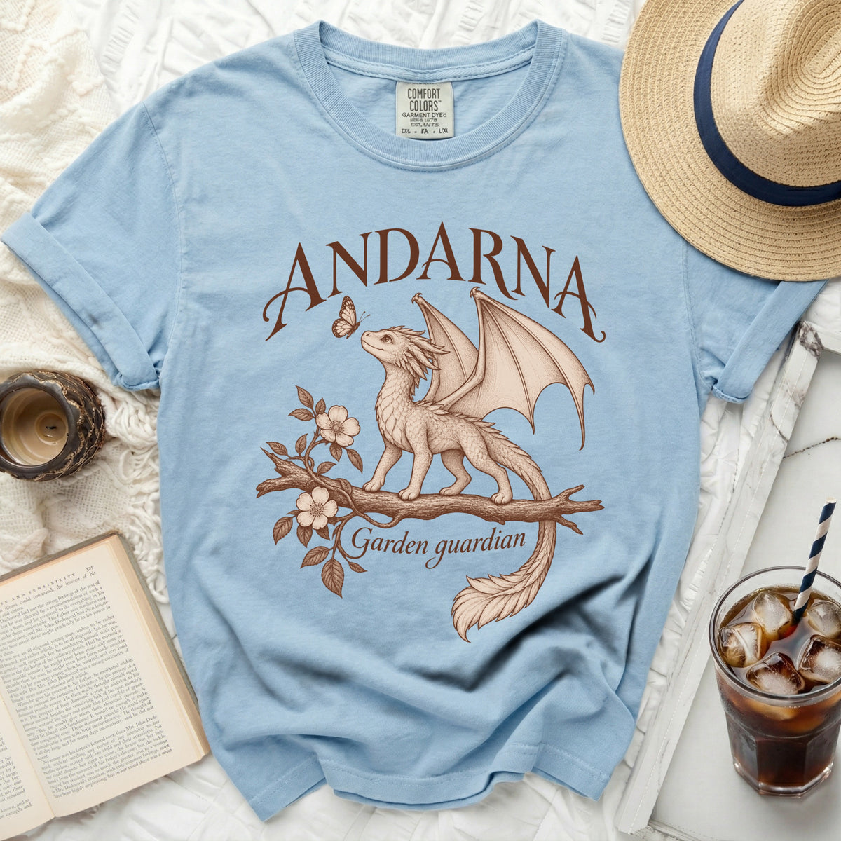 Light blue t-shirt with "ANDARNA Garden guardian" and a dragon illustration.