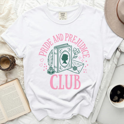 White t-shirt with pink and green "Pride and Prejudice Club" graphic.