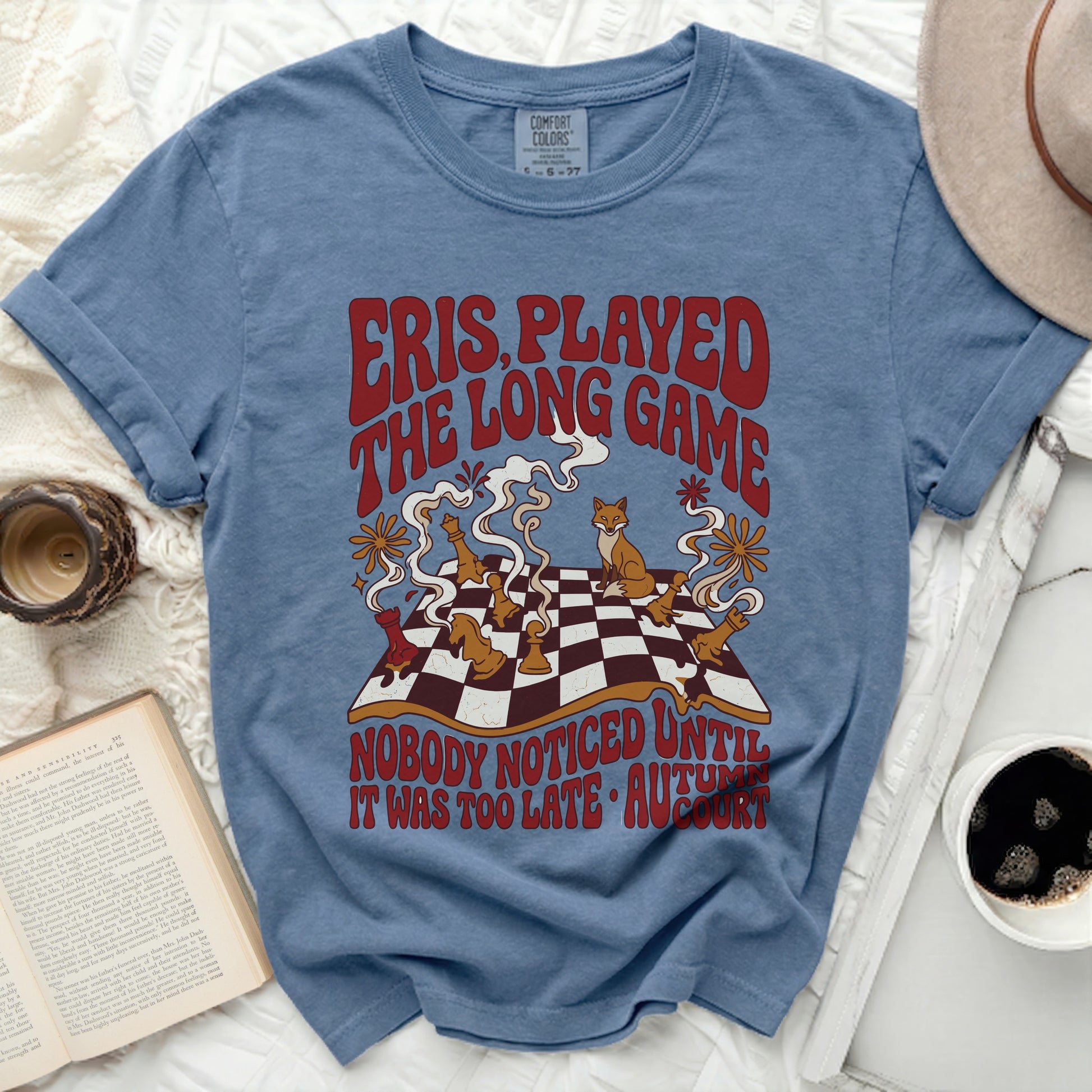 T-shirt with chess, fog, and text: "THE LONG GAME NOBODY NOTICED UNTIL IT WAS TOO LATE AUTUMN."