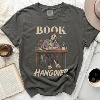 Skeleton reading with "BOOK HANGOVER" text above.