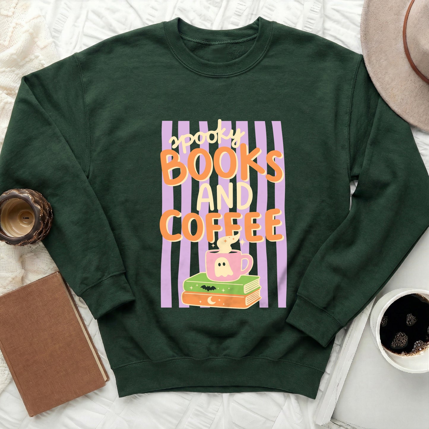 Dark green sweatshirt with "Spooky Books And Coffee" graphic and Halloween imagery.