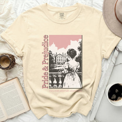 Pride & Prejudice graphic on a cream short-sleeved t-shirt