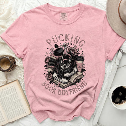 Pink t-shirt with "Pucking Book Boyfriend" hockey and book graphic.