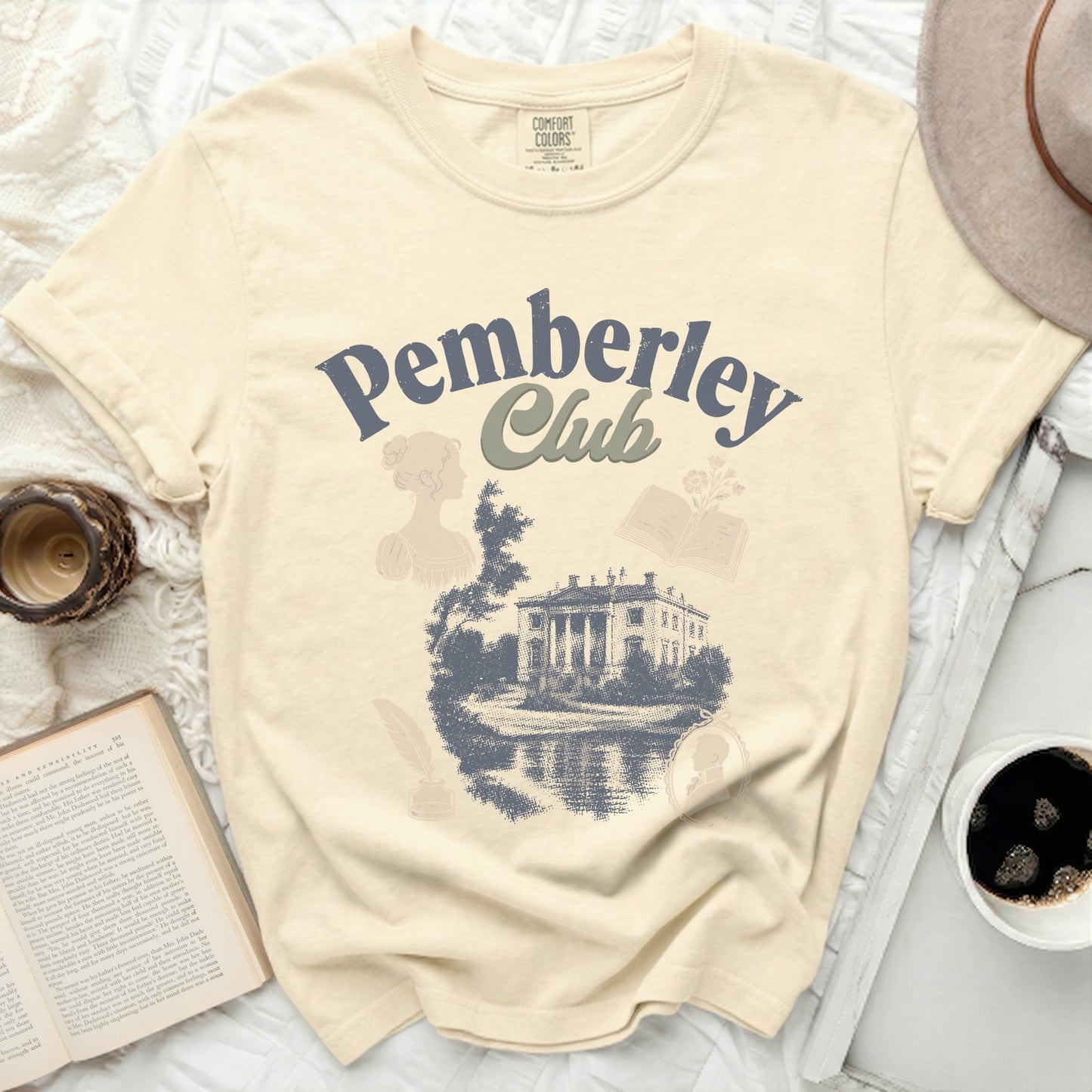Pemberley Club t-shirt with neoclassical building and reading motifs.