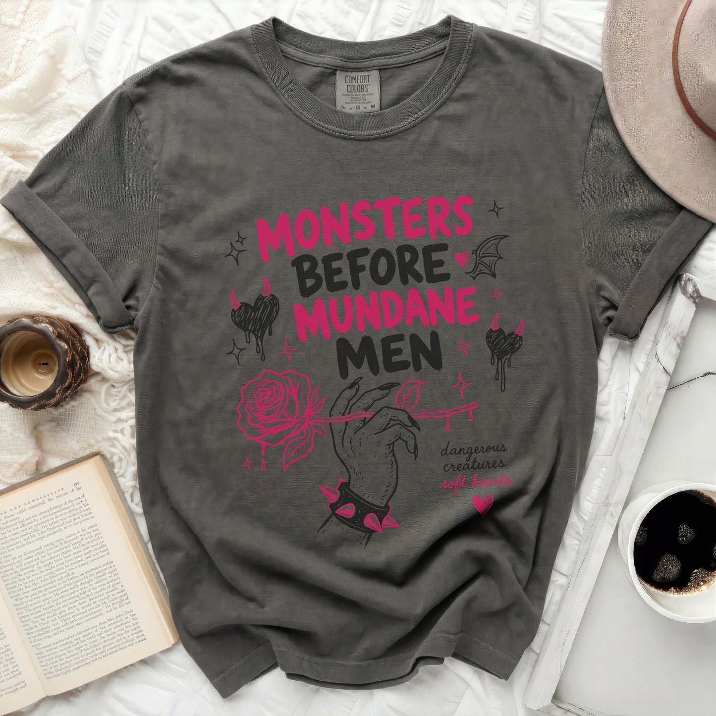 Gray t-shirt with "MONSTERS BEFORE MUNDANE MEN" and rose graphic.