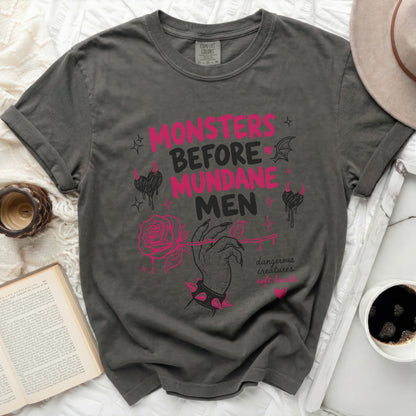 Gray t-shirt with "MONSTERS BEFORE MUNDANE MEN" and rose graphic.